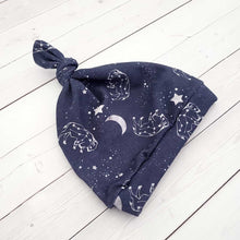 Load image into Gallery viewer, A pair of knot hats with a buffalo constellation and star design 2
